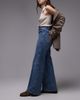 & Other Stories & Other Stories high rise wide leg jeans with double button waistband and pocket detail in mid wash blue - 2