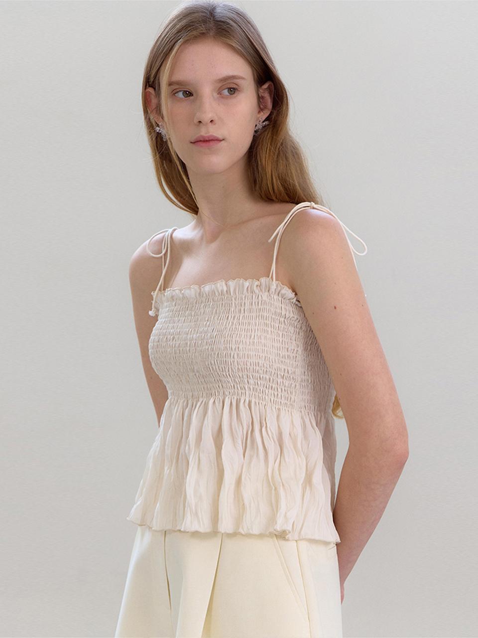 OVEOF Smocked Ruffle Hip Length Blouse [Cream]
