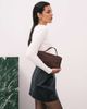 PASQ PASQ asymmetrical top handle and crossbody bag in burgundy-Red - 2