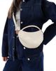 PASQ PASQ circle grab bag with crossbody strap in off-white - 1