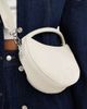 PASQ PASQ circle grab bag with crossbody strap in off-white - 4
