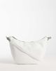 PASQ PASQ curved slouch cross body bag in white - 1