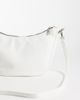 PASQ PASQ curved slouch cross body bag in white - 3