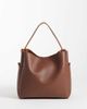 PASQ PASQ grab bucket bag with crossbody strap in brown - 1