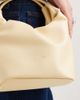 PASQ PASQ small top handle and crossbody drawstring bag in butter yellow - 4