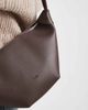 PASQ PASQ textured croissant crossbody bag in brown - 2
