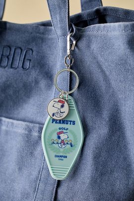 Peanuts Peanuts Snoopy Golf Hotel Keychain in Light Blue at Urban Outfitters