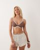 Peek & Beau Peek & Beau underwire bikini top with contrast trim in brown & white polka dot - 2