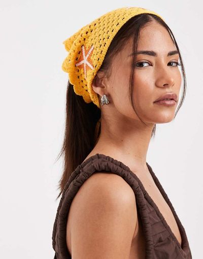 Pieces PIECES crochet starfish headband in yellow and orange