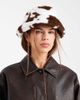 Pieces Pieces faux fur bucket hat in white cow print - 1