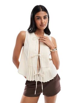 Pieces Pieces pleat detail tie front vest in cream-White