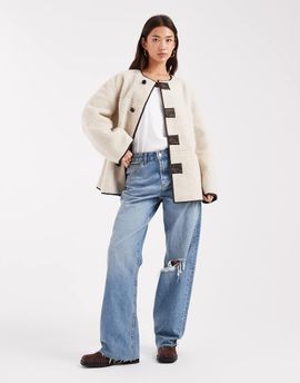 Pieces Pieces reversible teddy and faux leather jacket in cream and brown