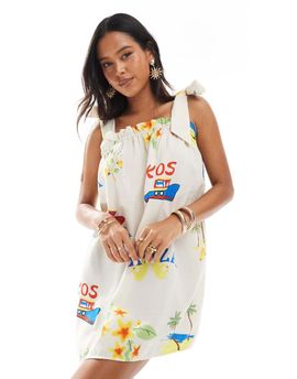 Pieces Pieces tie shoulder cami smock mini dress in cream based conversational print-Yellow