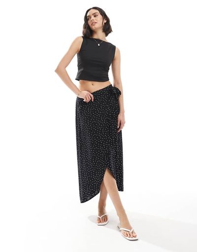 Pieces Pieces wrap midi skirt in black spot print
