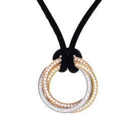 Pre-Owned Cartier Pre-Owned Cartier Trinity on Cord Necklace Silk Cord with 18K Tricolor Gold and Pave Diamonds Medium