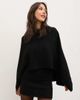 Pretty Lavish Pretty Lavish 2 in 1 knitted mini dress with cape in black - 2