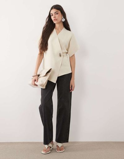 Pretty Lavish Pretty Lavish open sleeve hardware detail wrap jacket in cream-White