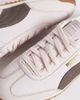 Puma Puma Palermo sneakers in green with gum sole and lace detail - 4