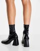 Raid RAID Clever mid heel sock boot in black patent - 2