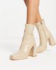 Raid Wide Fit RAID Wide Fit Vista heeled sock boots in ecru vinyl-White - 4