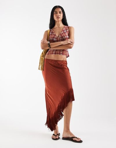 Reclaimed Vintage Reclaimed Vintage asymmetric hem midi skirt with tassels in rust red