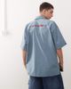 Reclaimed Vintage Reclaimed Vintage boxy short sleeve shirt with back embroidery detail in blue - 1