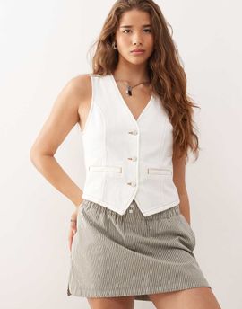 Reclaimed Vintage Reclaimed Vintage denim vest in ecru with contrast tobacco stitch-White
