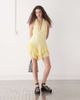 Reclaimed Vintage Reclaimed Vintage halter romper with ruffle shorts in yellow - 2