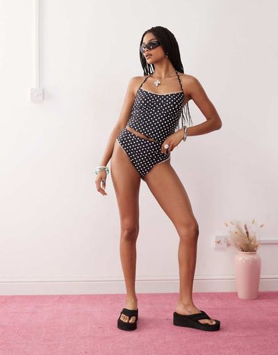 Reclaimed Vintage Reclaimed Vintage high waist bikini bottom with frilly trim in black polka dot print-Multi