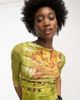 Reclaimed Vintage Reclaimed Vintage inclusive Y2K slash neck quarter sleeve top in green print - 1