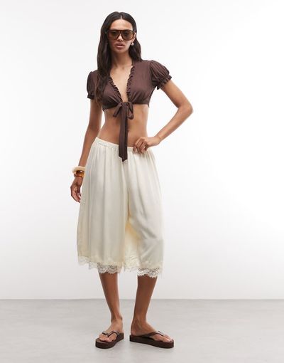 Reclaimed Vintage Reclaimed Vintage longline satin shorts with lace trim in ecru-White