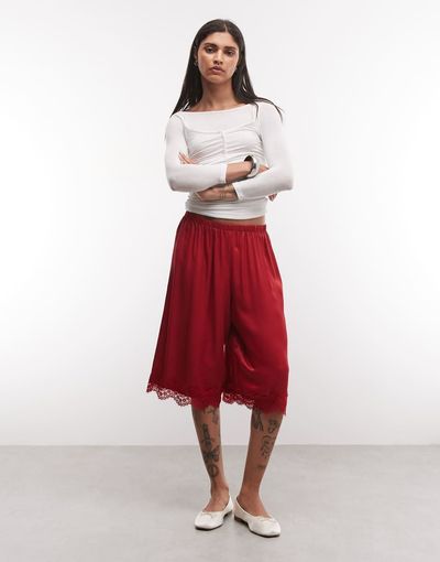 Reclaimed Vintage Reclaimed Vintage longline satin shorts with lace trim in red-White