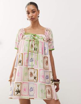 Reclaimed Vintage Reclaimed Vintage mini smock dress in bright postcard print with contrast trim-Multi