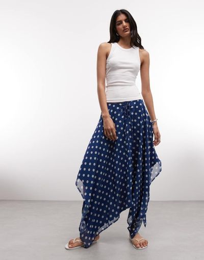 Reclaimed Vintage Reclaimed Vintage ruched midi skirt with asymmetric hem in navy polka dot print-Blue