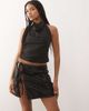 Reclaimed Vintage Reclaimed Vintage sequin mini skirt with side ties in black-Multi - 1