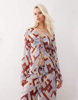 Reclaimed Vintage Reclaimed Vintage tie front sheer beach top in geo print-Multi