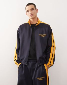 Reclaimed Vintage Reclaimed Vintage track jacket in navy with side stripes - part of a set