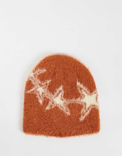 Reclaimed Vintage Reclaimed Vintage unisex skull beanie with star print in fluffy orange