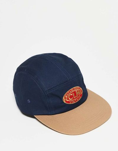 Reclaimed Vintage Reclaimed Vintage Unisex trucker cap with branding in navy blue-Multi