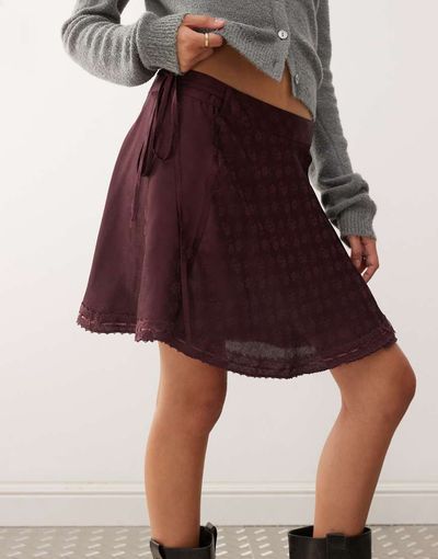 Reclaimed Vintage Reclaimed Vintage wrap mini skirt in purple satin jacquard