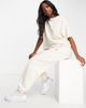 Reebok Reebok cropped t-shirt in off white - CREAM - 4