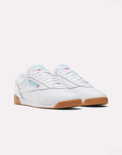 Reebok Reebok Freestyle Lo sneakers in white with gum soles
