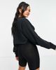 Reebok Reebok small central logo long sleeve top in black - 2