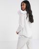 River Island Petite River Island Petite frill shoulder detail top in white - 2