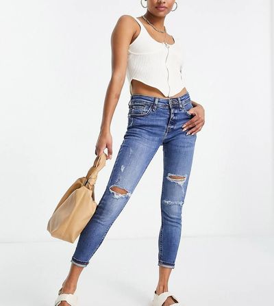 River Island Petite River Island Petite mid rise skinny jeans with rips in dark blue