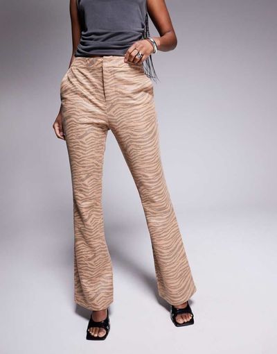 River Island River Island faux leather bootleg pants in tiger print-White