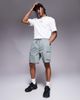 River Island River Island stretch cargo shorts in light green - 1