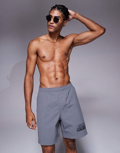 River Island River Island swim shorts with dragon print in gray