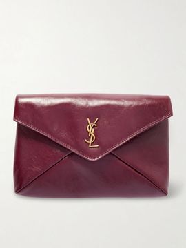 SAINT LAURENT Cassandre large glossed-leather clutch