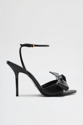 Schutz Schutz Elodie Buckle Strap Bow Heeled Sandals in Black, Women's at Urban Outfitters